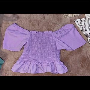 Cute purple off the shoulder cropped blouse from thrive boutique.